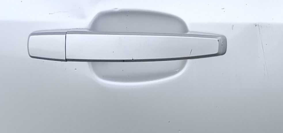 Зовнішня ручка задньої правої дверки Opel Astra J.