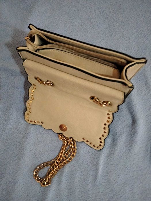 mala nova em couro trabalhada