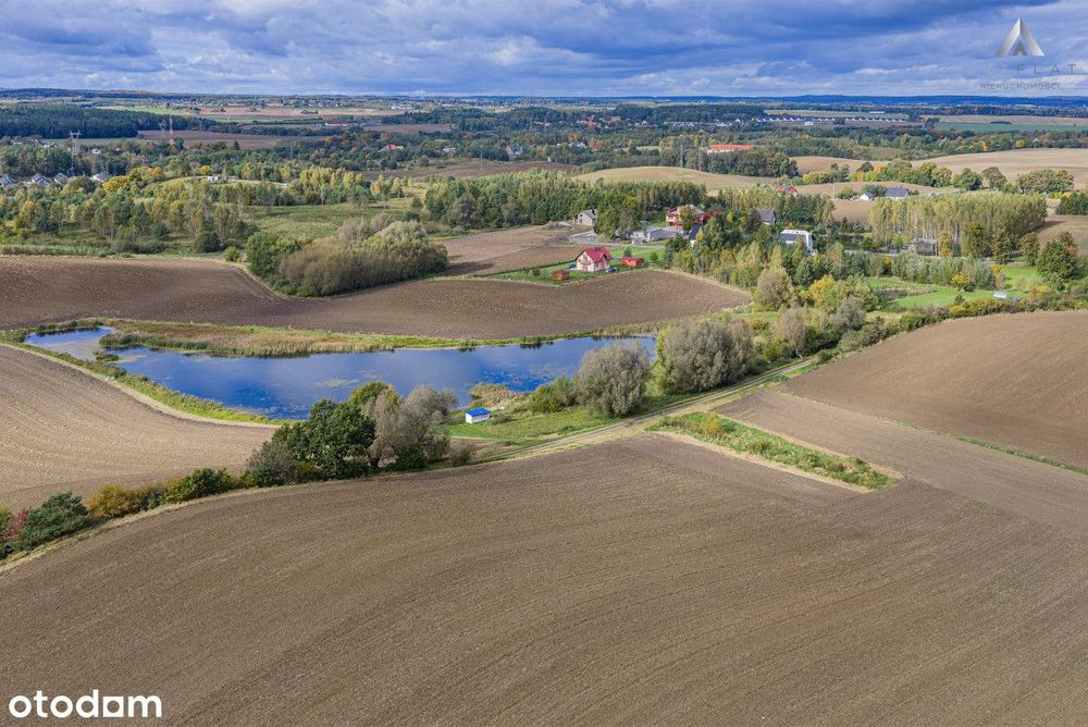 Malownicza, ogrodzona  działka z WZ
