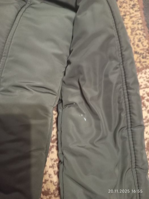 Теплюща зимова куртка