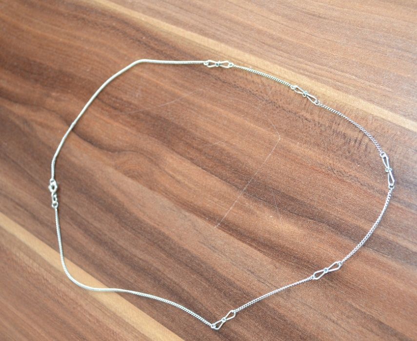 Łańcuszek srebrny z kokardkami