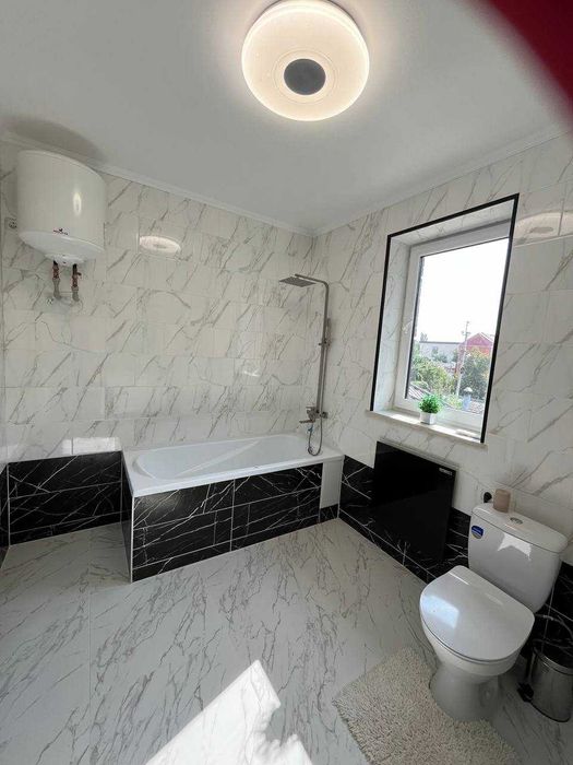 Продам 2-х этажный, современный, дом новой постройки в Центре