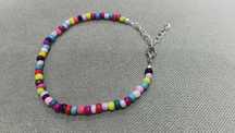 Pulseira de missangas para tornozelo