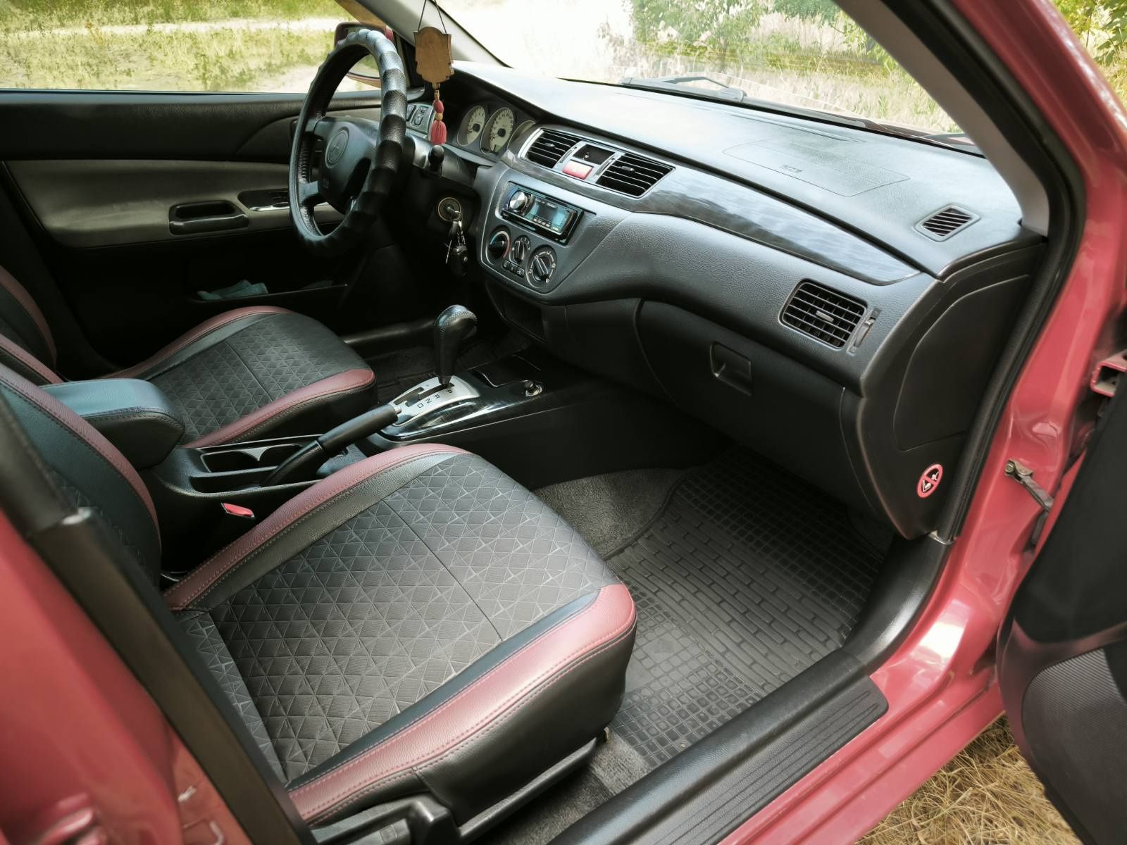 Mitsubishi Lancer 9 2004 (2005) 1.6, автомат