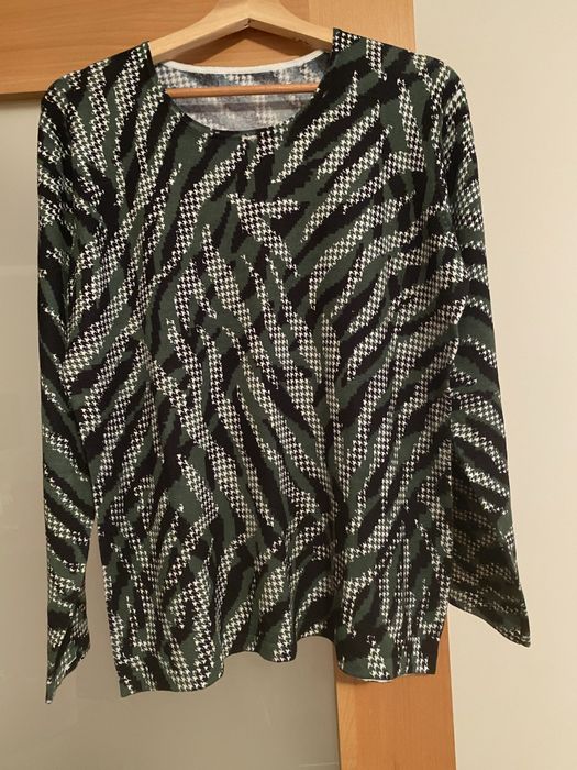 Camisola de senhora com uma textura fofa e confortavel