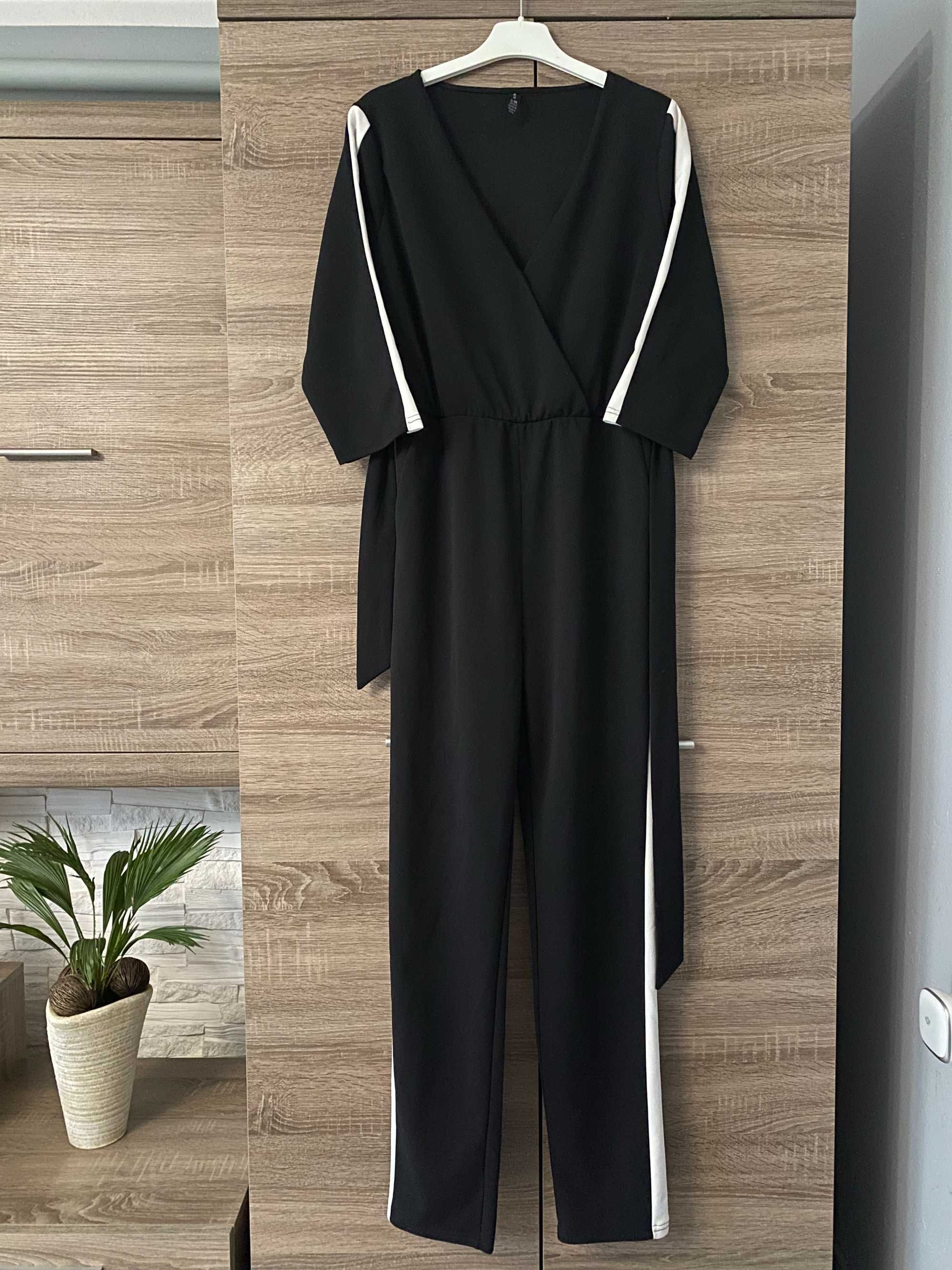 Kombinezon długi czarny damski elegancki z paskiem kieszonkami Amisu M