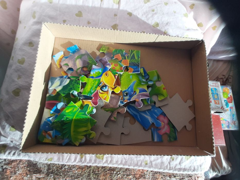 Продам пазли динозаври