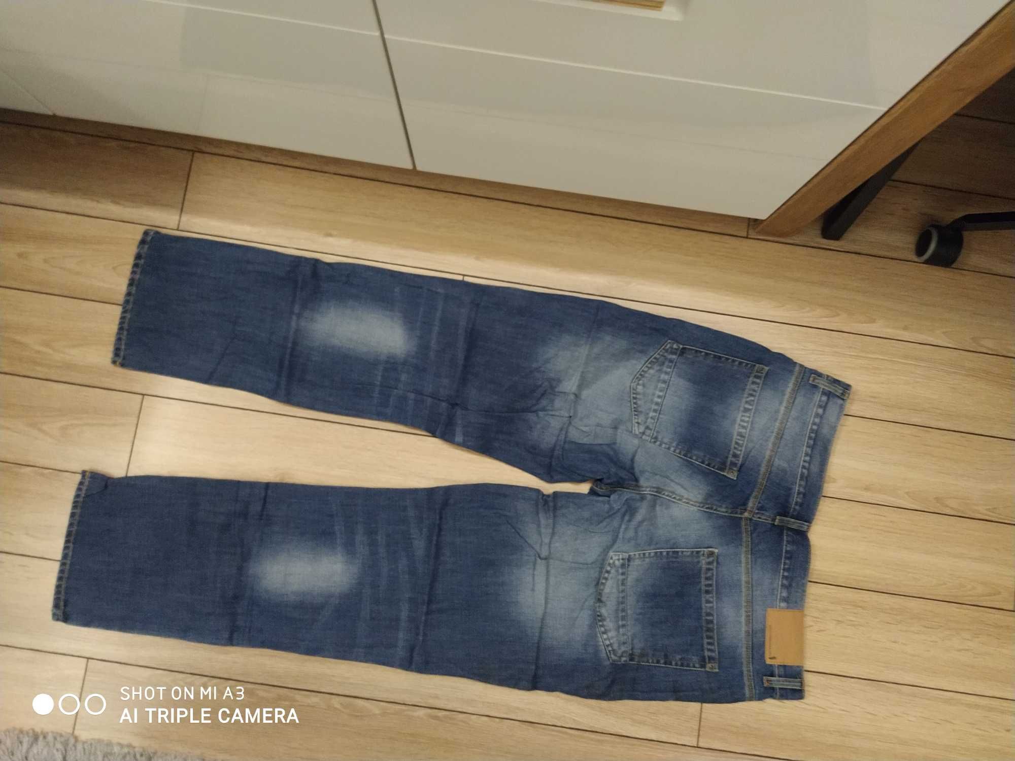 Spodnie markowe Top Secret L/XL na sprzedaż stan bardzo dobry