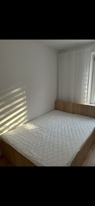 Łóżko 140x200 z materacem i pojemnikiem na posciel