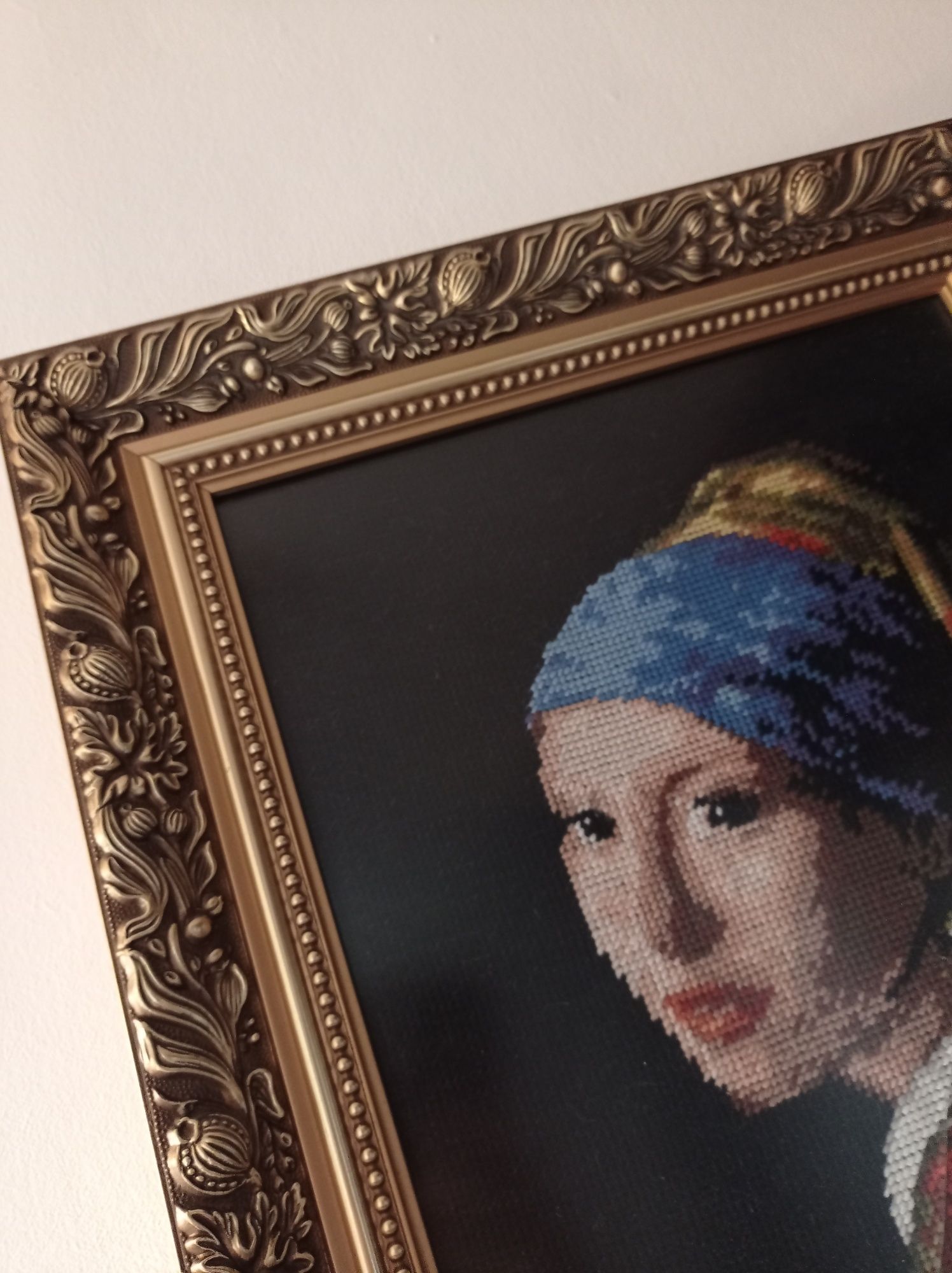 Obraz haftowany Dama z perłą utorstwa Jana Vermeera.
