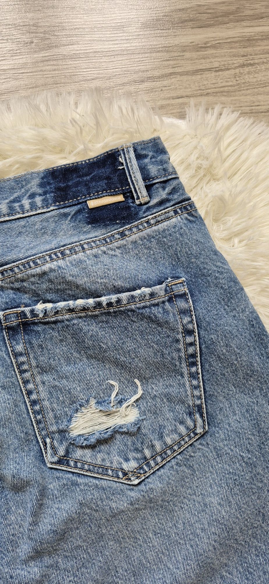 Stradivarius jeansy z przetarciami prosty fason M /38