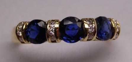 Złoty pierścionek szafiry i diamenty R.13