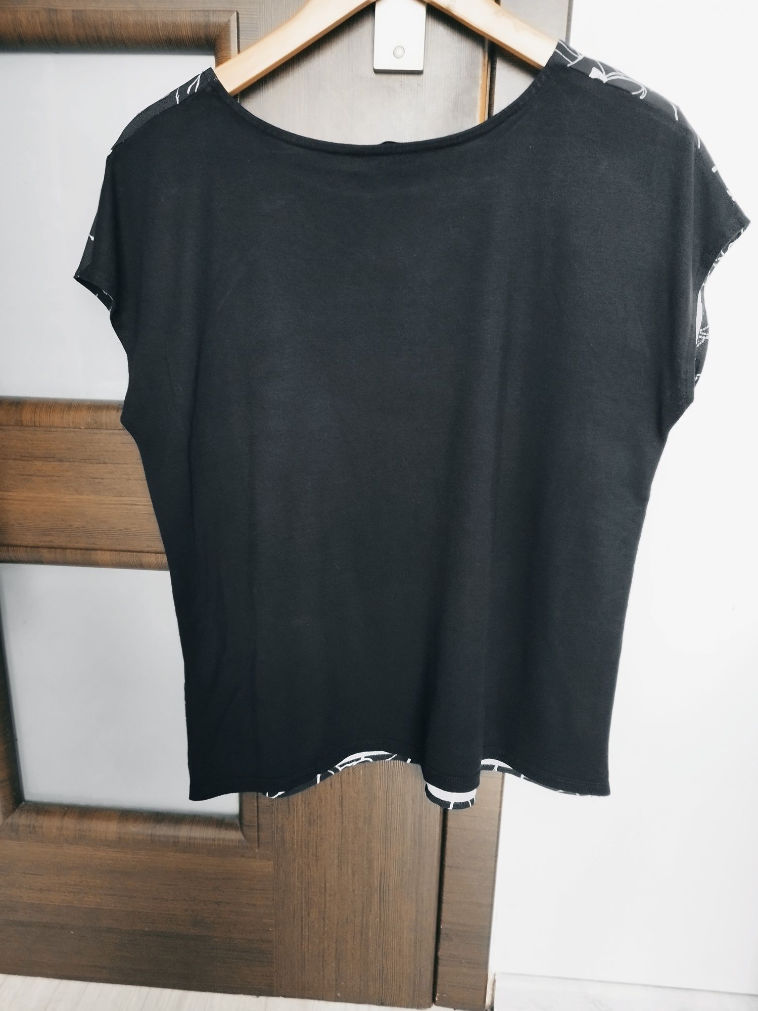 Bluza damska
Rozmiar 12
Wymiary:
Długość całkowita 63 cm
Szerokość pod