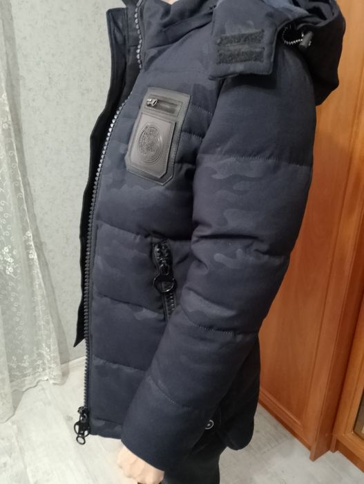 Продам зимову куртку на підлітка 12-13 років.