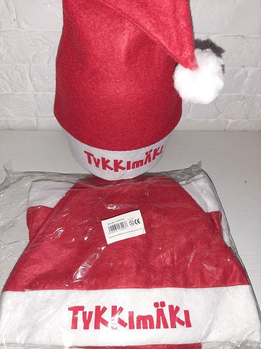 Новая упаковка шапок "Санта Клауса" на корпоротив.