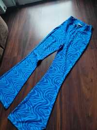 Sinsay dzwony luźne nogawki legginsy disco retro woda niebieskie wzory