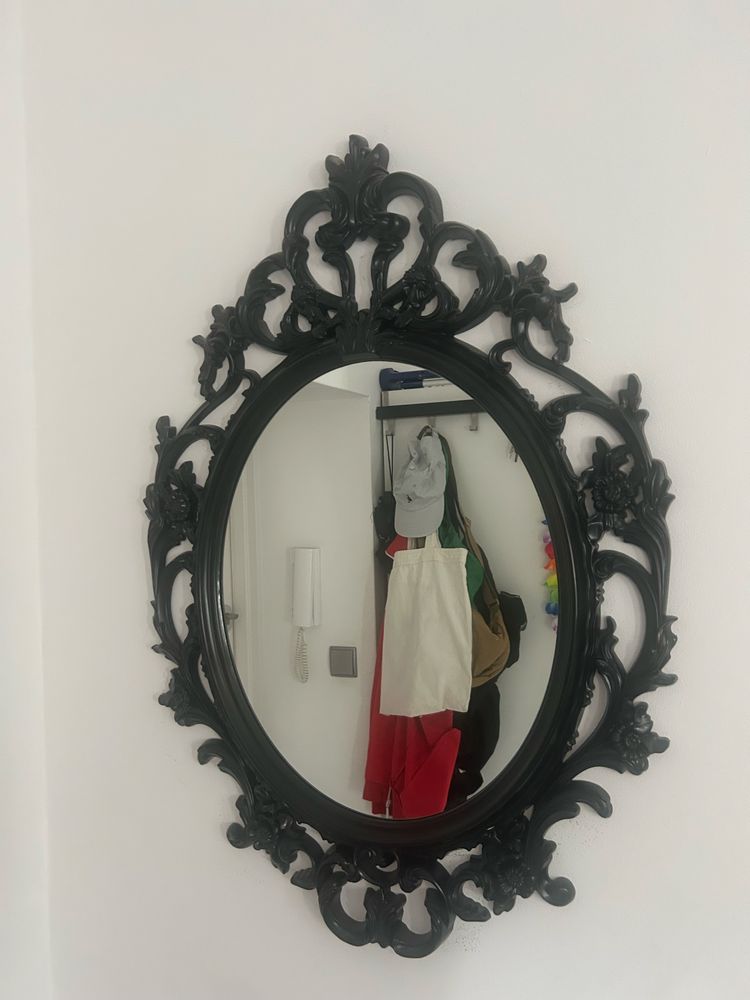 Owalne lustro w czarnej ozdobnej ramie (Odbior osobisty]