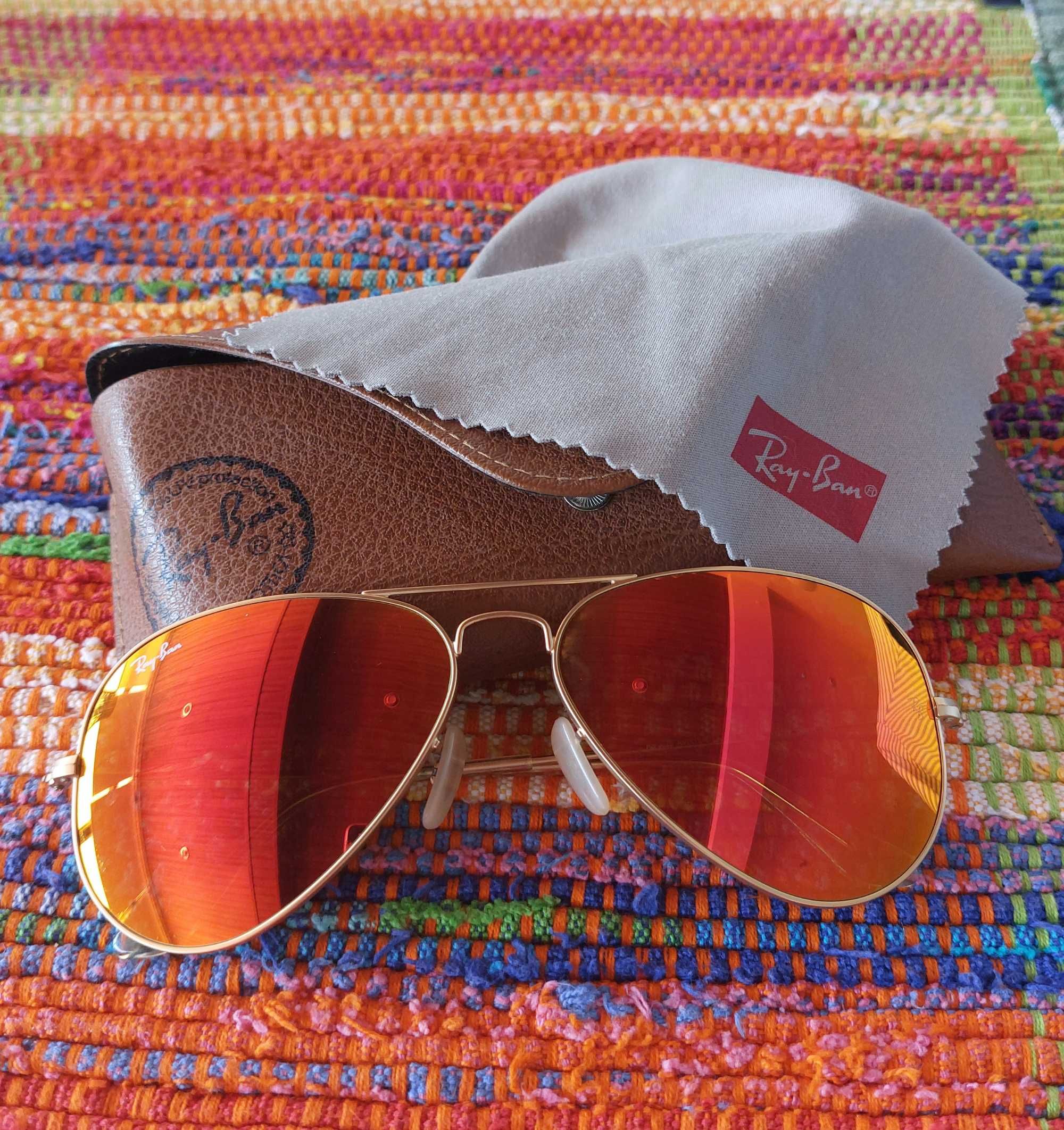 Óculos RayBan Aviator dourados e laranja
