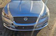 JAGUAR XJ X351 3.0D MASKA BŁOTNIKI ZDERZAK LAMPY PAS KOMPLETNY PRZÓD MEE