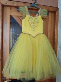 Жовта сукня на дівчинку 7-8 років