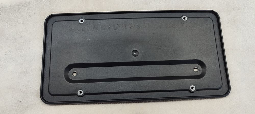 1096844-00-B кронштейн номерного знака Tesla. подіум