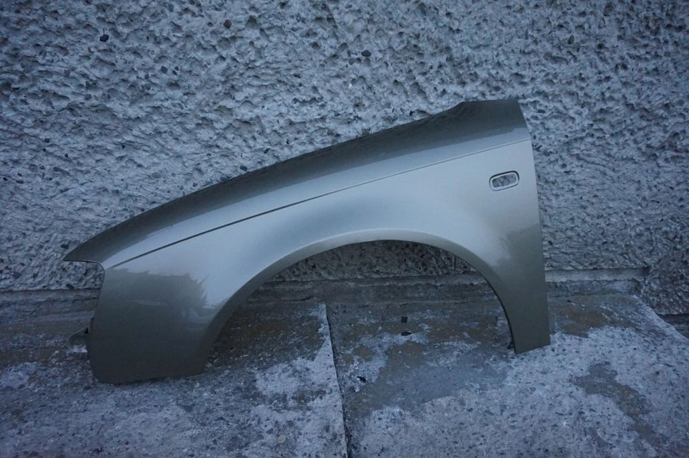 BŁOTNIK PRZEDNI LEWY AUDI A4 B7 LY1Q 04/07r