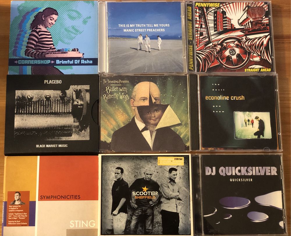 CDs duplos, singles, importados