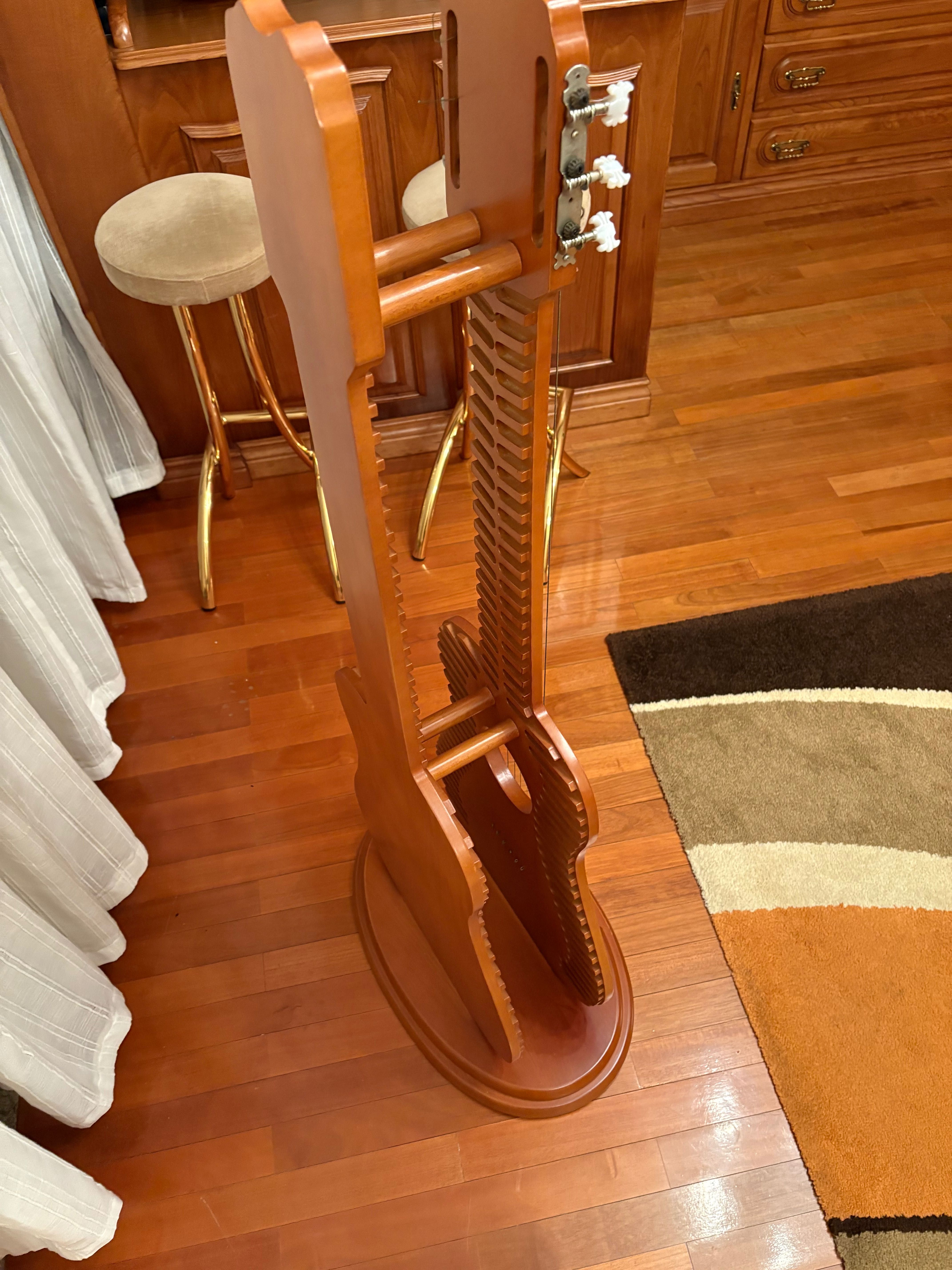 Guitarra estante para CD’s