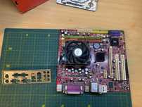 Плата от MSI с процесором и кулиром