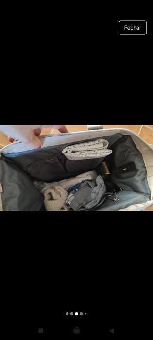 Mochila com berço portátil