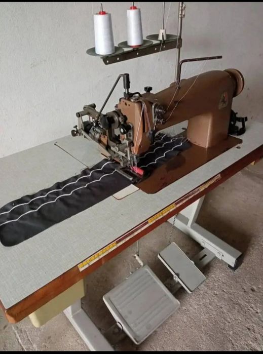 Máquina costura, boleio