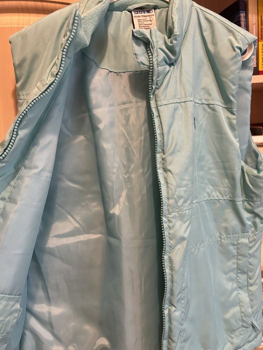 Жилетка блакитного кольору