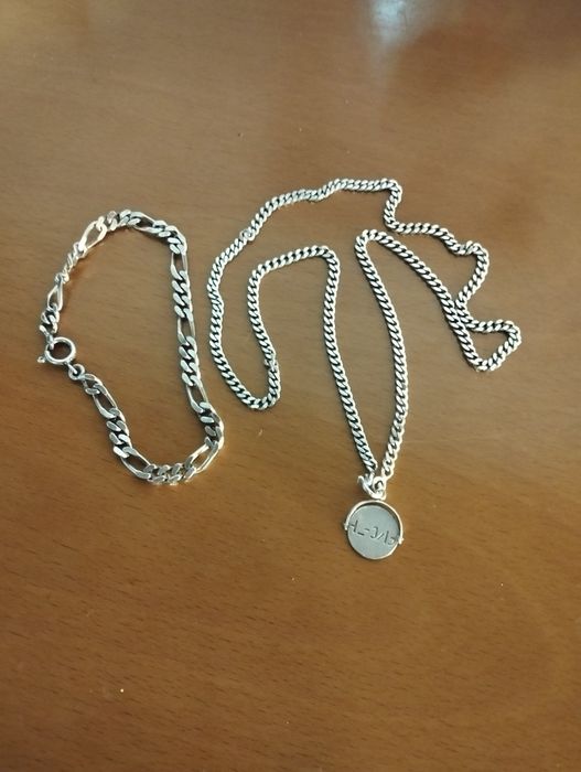 fio de prata com medalha e pulseira de prata
