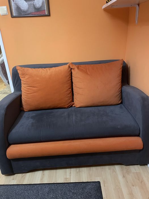 Łóżko rozkładane z funkcją spania i skrzynią na posciel