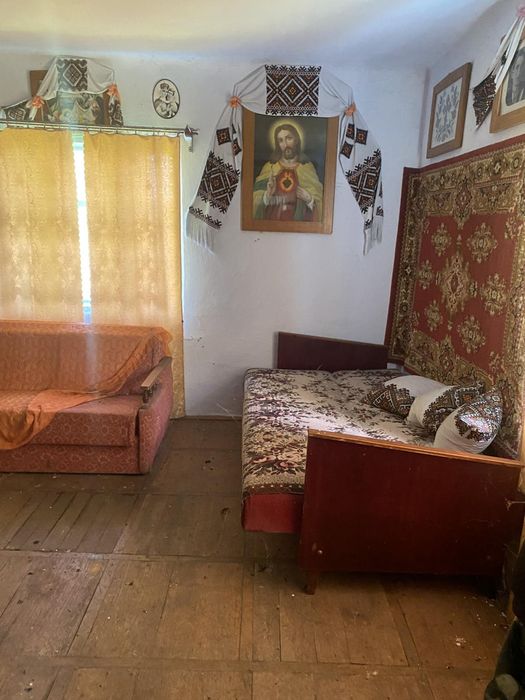 Будинок земельною ділянкою 50 сотих