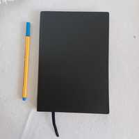livro/caderno/bloco-notas preto de linhas