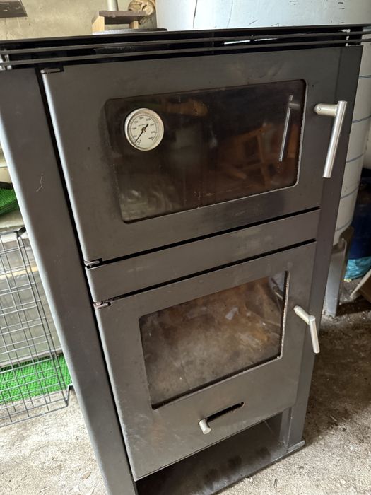 Vendo salamandra a lenha com forno