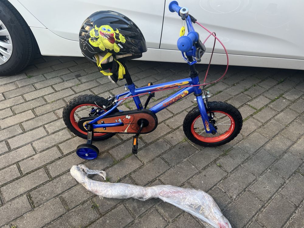 Rowerek dziecieńcy  12Cal  Dragon super stan kółka.+prowadnik +kask