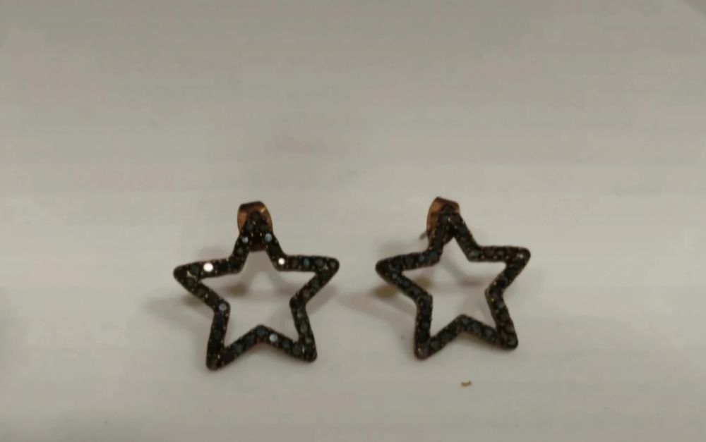 Brincos em estrela com zircónias