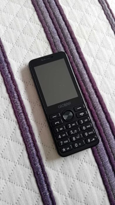 Alcatel  modelo:2003G