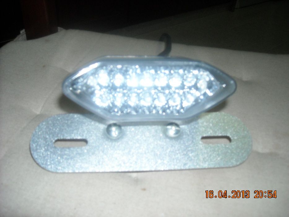 Farol universal com piscas incorporados em ledes para vários motos