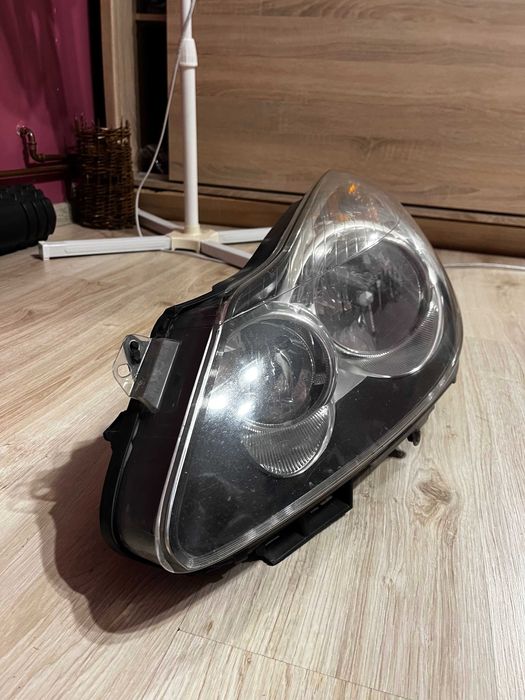 lampa przednia lewa opel corsa d 2010