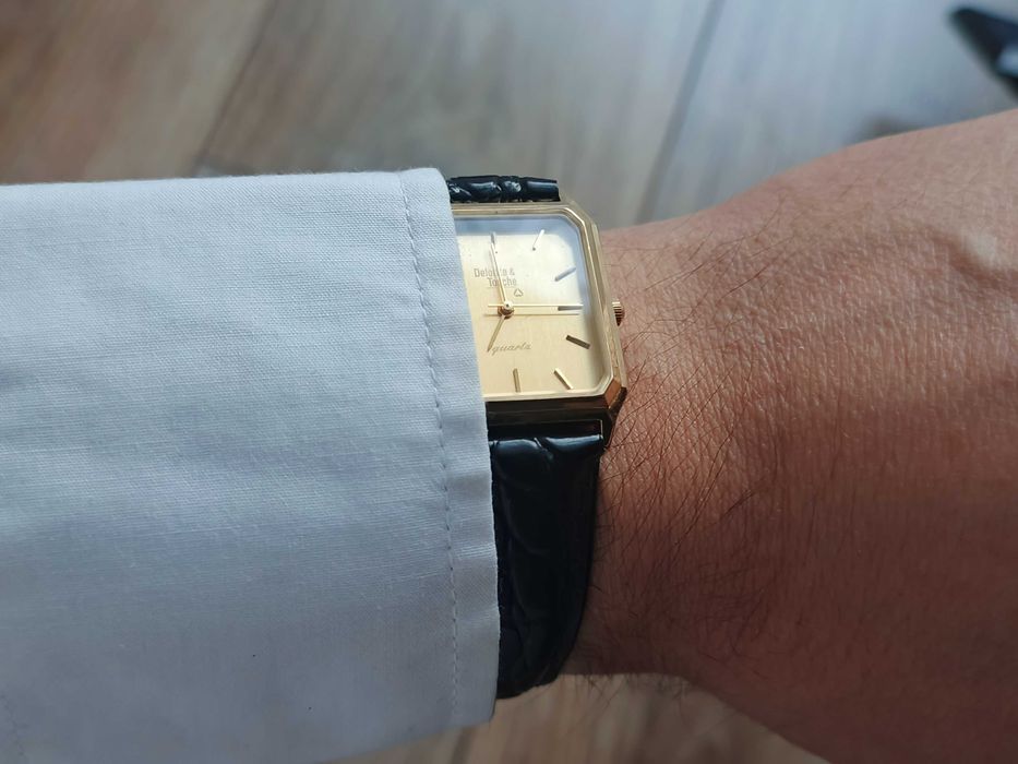 Sprzedam złocony męski zegarek garniturowy Deloitte & Touche