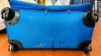синій чемодан довжиною 72см 25см 50см