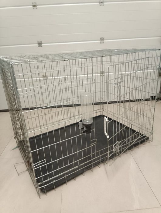 Металева клітина для собак.