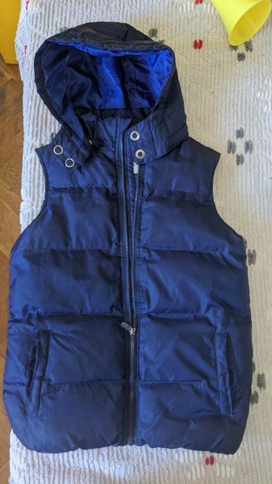 Продам жилетку 146 см