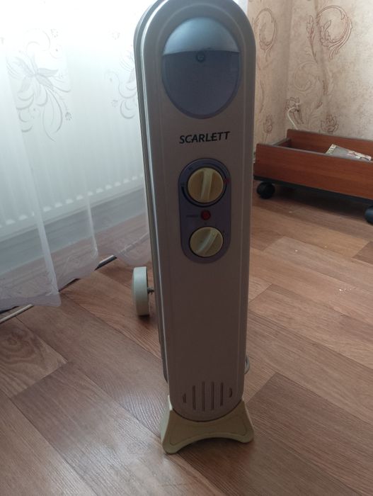 Масляний обігрівач