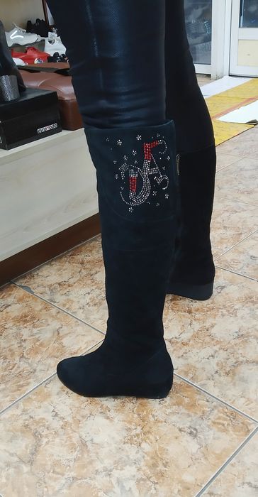 Высокие зимние сапоги