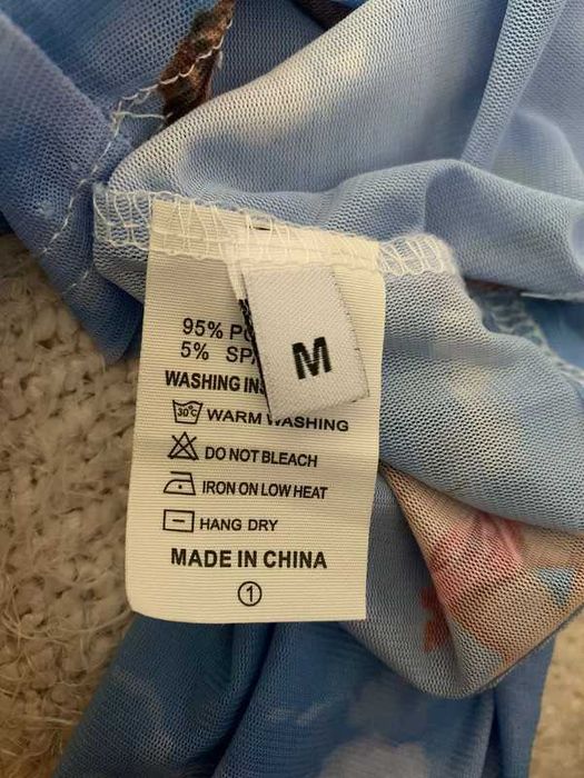 Top azul claro de manga comprida com gola, transparente Shein