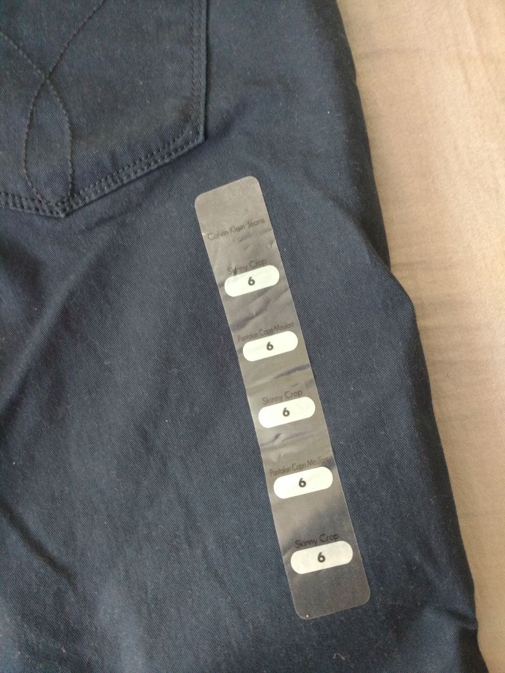 Granatowe spodnie 3/4 Calvin Klein rozm. 6